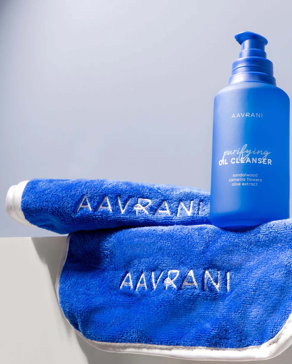 AAVRANI Face Towel Set lifestyle shot featuring Purifying Oil Cleanser