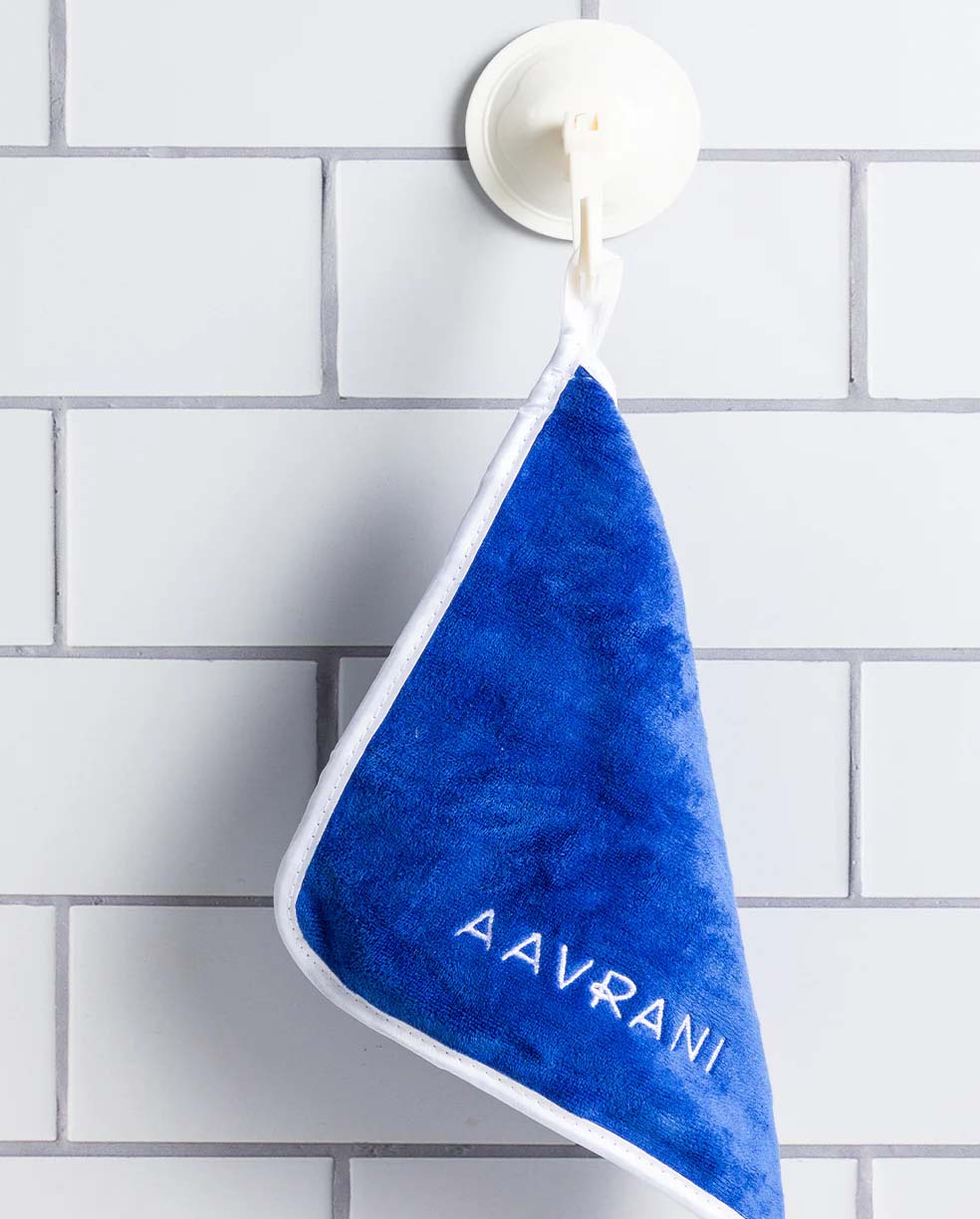 AAVRANI Face Towel Set against tile background