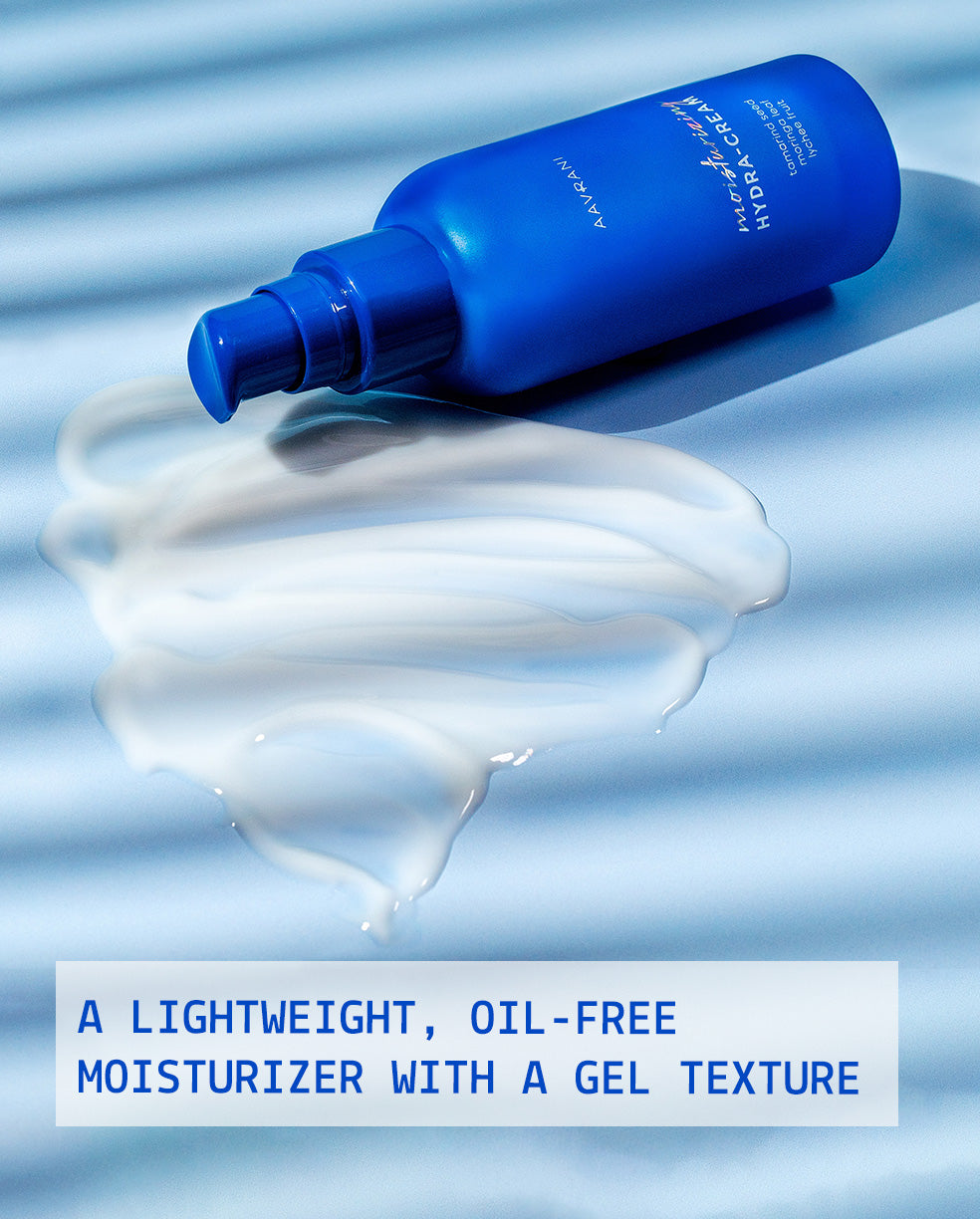 AAVRANI Moisturizing Hydra-Cream Texture Swatch Against Blue Background. A lightweight, oil-free moisturizer with a gel texture.